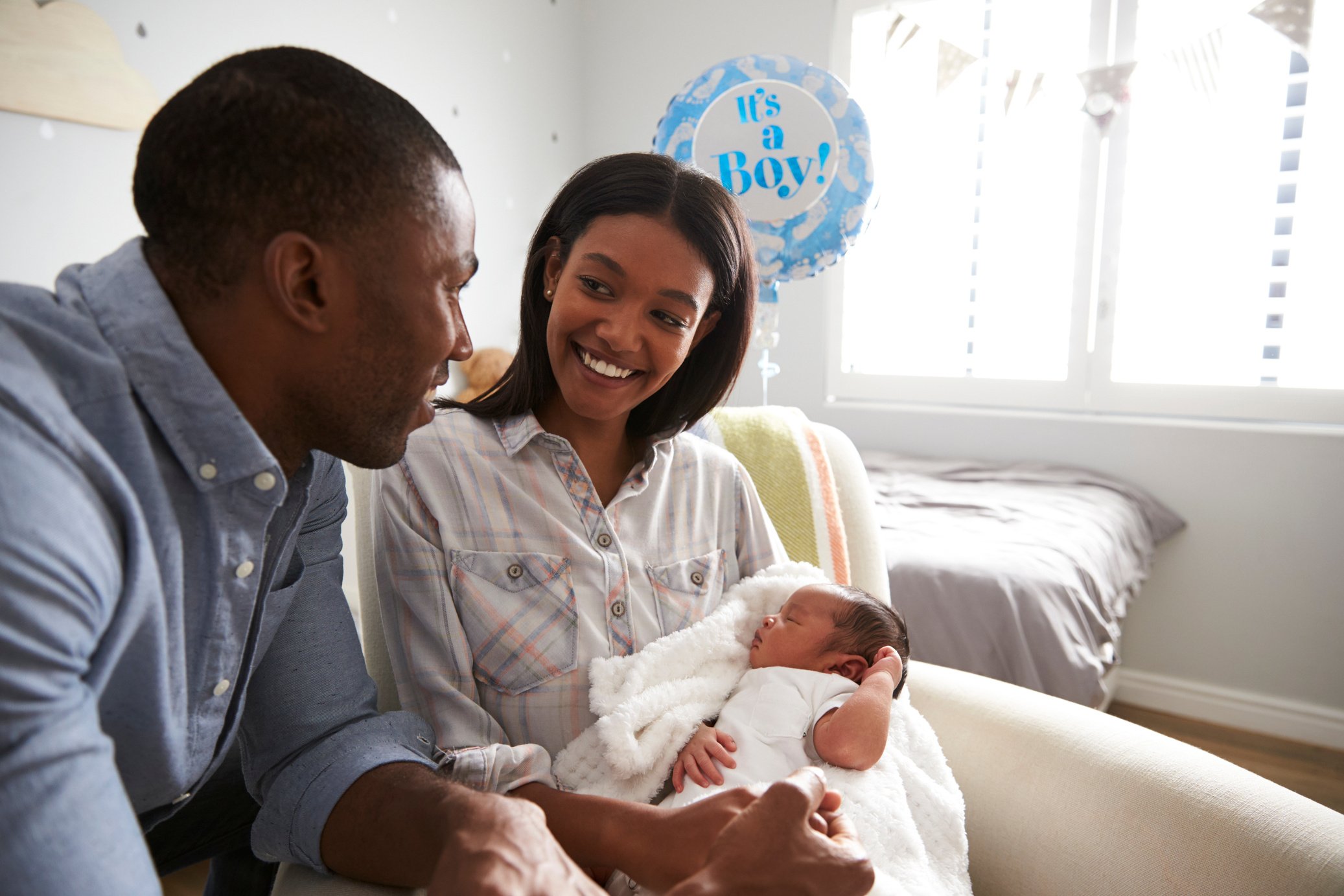 Parents Home from Hospital with Newborn Baby